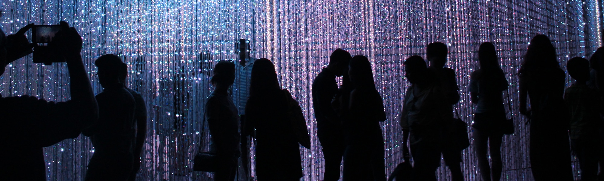 Group of people experiencing an art installtion