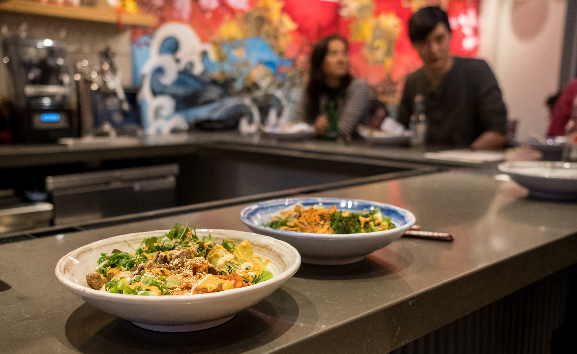 asian streetfood dishes on open counter